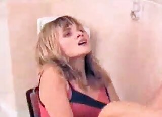 Blond zoophile whore moans while her dog is fucking wet twat of hers